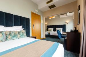 Postel nebo postele na pokoji v ubytování Hotel DAH - Dom Afonso Henriques + 139 fotografií