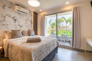 Ένα ή περισσότερα κρεβάτια σε δωμάτιο στο Apartamentos Santa Marina by C - HOST +199 φωτογραφίες
