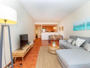 A seating area at Apartment Green Mar H by Interhome
