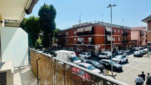 a view of a parking lot with cars parked at CASA Degli ARTISTI in Acilia