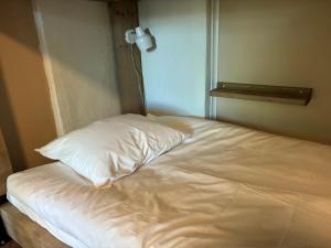 Postel nebo postele na pokoji v ubytování La Casa Klippan
