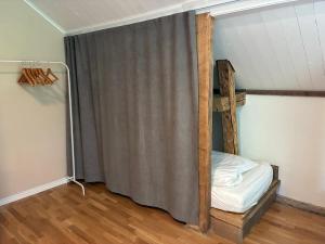 Postel nebo postele na pokoji v ubytování La Casa Klippan
