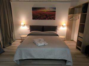 A bed or beds in a room at A Casa di Fede
