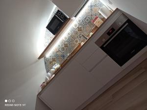 A kitchen or kitchenette at A Casa di Fede
