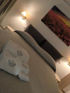 A bed or beds in a room at A Casa di Fede