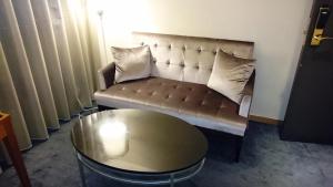 Χώρος καθιστικού στο Delight Hotel
