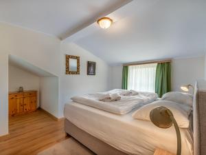 Ένα ή περισσότερα κρεβάτια σε δωμάτιο στο Apartment Paulsberg by Interhome