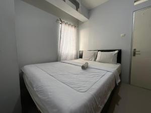 Postel nebo postele na pokoji v ubytování Transit ID + 8 fotografií