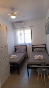 Postel nebo postele na pokoji v ubytování Apartman Marica