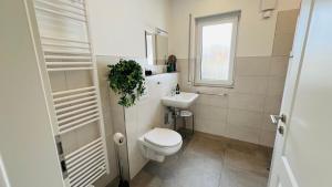 Bilik mandi di Ferienwohnung Lee