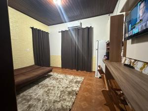 Μια τηλεόραση ή/και κέντρο ψυχαγωγίας στο Ap bem localizado
