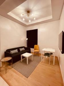 Posezení v ubytování Relax Family 01 - Cozy Entire Apartement in City Center