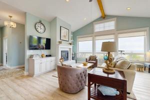 a living room with a couch and a table at Alta Vista in Pacific City