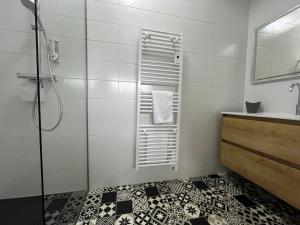 Koupelna v ubytování La Cour de Mamama Appartement 7 + 5 fotografií