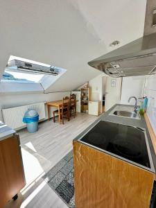 a kitchen with a sink and a counter top at Ferien und Monteurenwohnung in Geislingen an der Steige