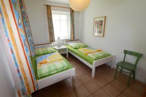 Postel nebo postele na pokoji v ubytování Haus am Wald Nr 2 idyllisch ruhig im Naturschutzgebiet