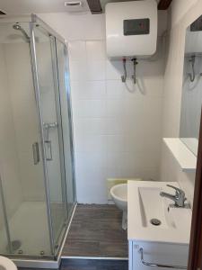 a bathroom with a shower and a sink at luxury ciccy apartment in Reggio di Calabria
