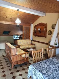 TV a/nebo společenská místnost v ubytování B&B Mimosa