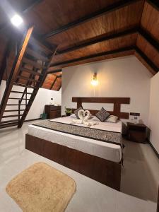 Postel nebo postele na pokoji v ubytování Divine Eco Resort