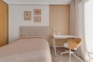 Ένα ή περισσότερα κρεβάτια σε δωμάτιο στο Comfy Apartment Del Cura