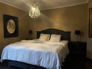 Voodi või voodid majutusasutuse Hotell Vaxblekaregården toas