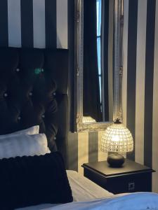 Voodi või voodid majutusasutuse Hotell Vaxblekaregården toas