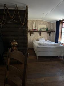 Voodi või voodid majutusasutuse Hotell Vaxblekaregården toas