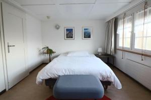 Postel nebo postele na pokoji v ubytování Hotel am Schönenbühl