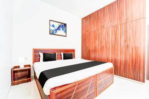Postel nebo postele na pokoji v ubytování Super Hotel O Aarapalayam