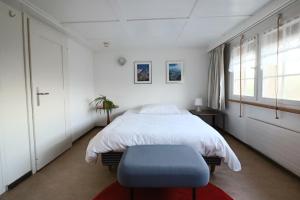 Postel nebo postele na pokoji v ubytování Hotel am Schönenbühl