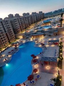 Kolam renang di atau dekat dengan شاليه بقرية اكوافيو