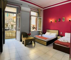 Voodi või voodid majutusasutuse Hostgram Hotel in cairo toas