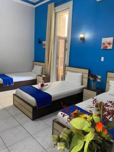 Voodi või voodid majutusasutuse Hostgram Hotel in cairo toas