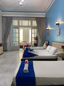 Voodi või voodid majutusasutuse Hostgram Hotel in cairo toas