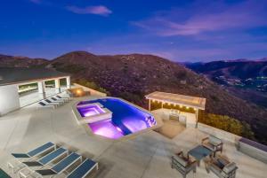 a house with a swimming pool on a roof at Serene Resort-Style Escape - Perfect for Families in El Cajon +43 photos