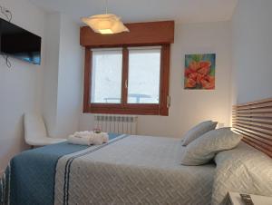 Posteľ alebo postele v izbe v ubytovaní Anguiano Habitaciones rurales con baño privado
