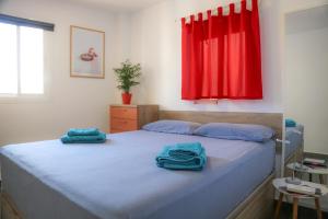Łóżko lub łóżka w pokoju w obiekcie Apartment Calle Larga