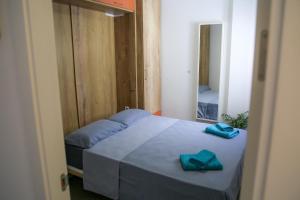 Łóżko lub łóżka w pokoju w obiekcie Apartment Calle Larga