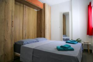 Łóżko lub łóżka w pokoju w obiekcie Apartment Calle Larga