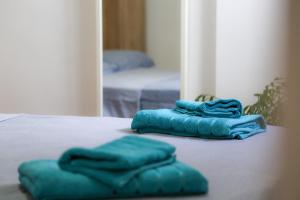 Łóżko lub łóżka w pokoju w obiekcie Apartment Calle Larga