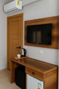 Η κουζίνα ή μικρή κουζίνα στο Acar Airport Hotel Plus