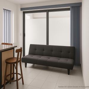 a living room with a couch and a stool at Mini Suite 3 Cerca de Aut MEX QRO in Cuautitlán Izcalli