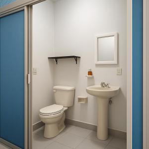 a bathroom with a toilet and a sink at Mini Suite 3 Cerca de Aut MEX QRO in Cuautitlán Izcalli