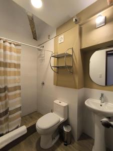 Baðherbergi á Flying Dog Hostel Cusco