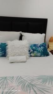 Ένα ή περισσότερα κρεβάτια σε δωμάτιο στο Dups Guest House,