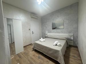 Postel nebo postele na pokoji v ubytování Hotel Eriale Nuova Gestione