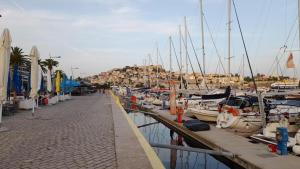a bunch of boats docked in a marina at Lydia Home in Kavala