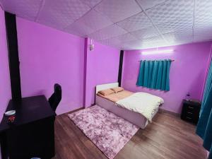 Una cama o camas en una habitación de Maa Buu Chhen