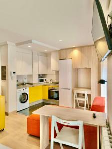 Kuchyň nebo kuchyňský kout v ubytování Apartamentos 19 Living