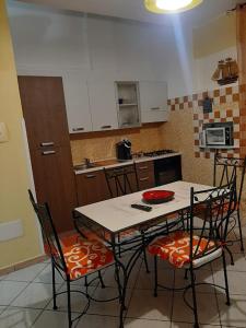 Kuchyň nebo kuchyňský kout v ubytování Conchiglie 7